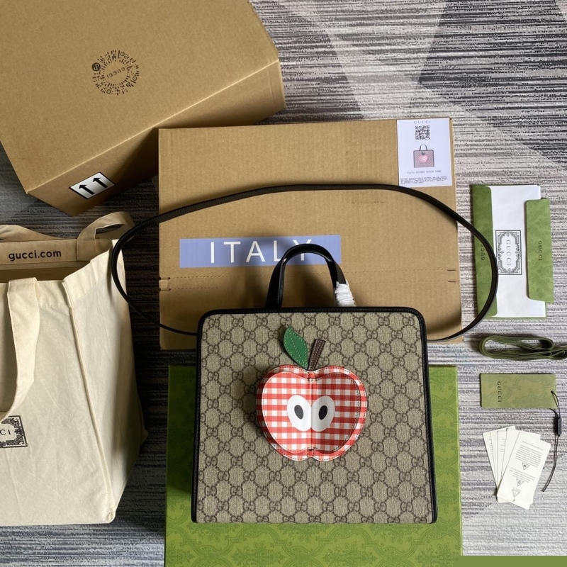 G*u*i shopping bags